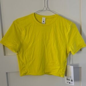lululemon athletica nulu crew neck cropped tee yellow medium. NWT
